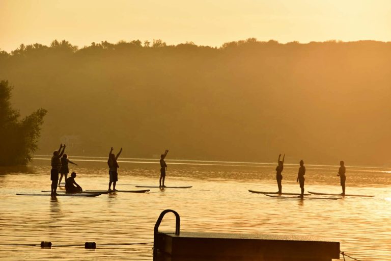 Find Your Balance with Paddleboard Yoga at Camp Sequassen